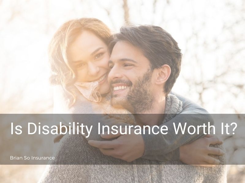man-carrying-woman-outdoors-smiling-disability-insurance-worth-it