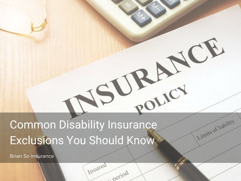 policy-document-calculator-glasses-on-table-disability-insurance-exclusions