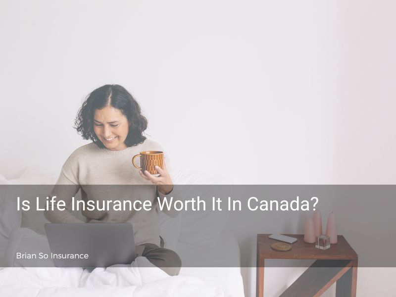 Is-Life-Insurance-Worth-It-In-Canada-woman-with-laptop-and-coffee-smiling-on-bed