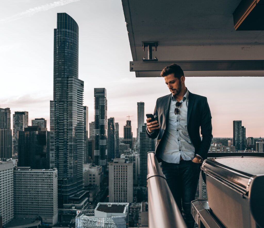 Ontario professional using phone in condo